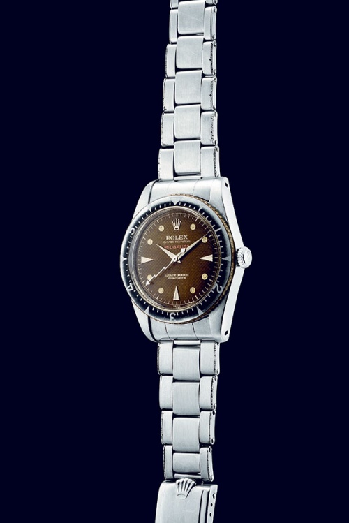 Lot 285, Rolex. A very fine and very rare stainless steel anti-magnetic wristwatch with 'tropical' honeycomb dial, flash hand and bracelet, ref 6541